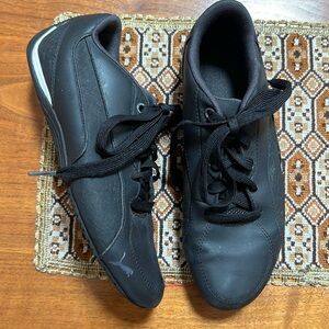 Puma black sneakers size 6.5